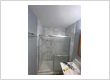 Bathroom shower remodel featuring modern tile installation and upgraded finishes
