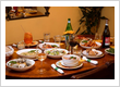 Cozy Italian Dining Setup with Gourmet Food & Drinks