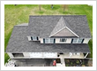 Utilizing a variety of roofing materials suited to local climates, including single-ply systems (TPO, PVC, EPDM), asphalt shingles, architectural panels, and metal roofing.