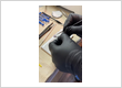 Dental lab technician working on dental crown at Orlando dentist Lake Lucerne Cosmetic and Implant Dentistry