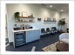 The welcoming patient comfort lounge featuring a coffee bar at Comprehensive Dentistry in Saline, MI