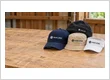 Custom caps and branded headwear with your logo: navy cap, bucket hat, beanie and visor