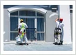 imgi 10 homeguide commercial painters working on building exterior