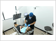 Denver dentist Dr. Katanov performing root canal at Diamond Dental Group