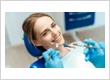 woman receiving holistic dental care in ottawa on 1024x576