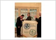 Dr. Ayman Attia Alla receiving recognition and a ceremonial medal at the 217th Annual Past President
