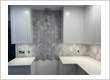Herringbone kitchen backsplash completed for Calgary client